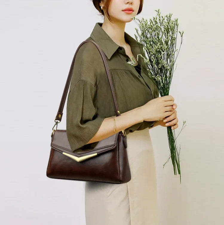 Bolsa em Couro Legítimo - Lona